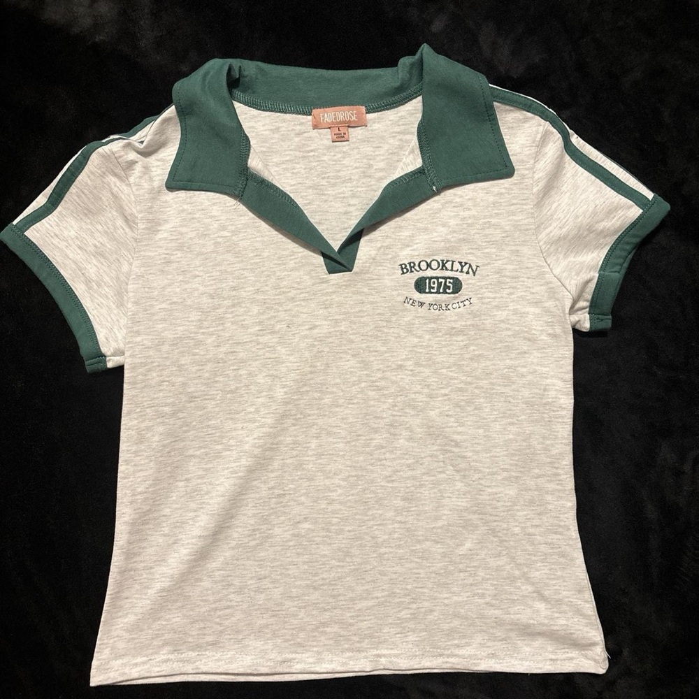 green and white grayish polo